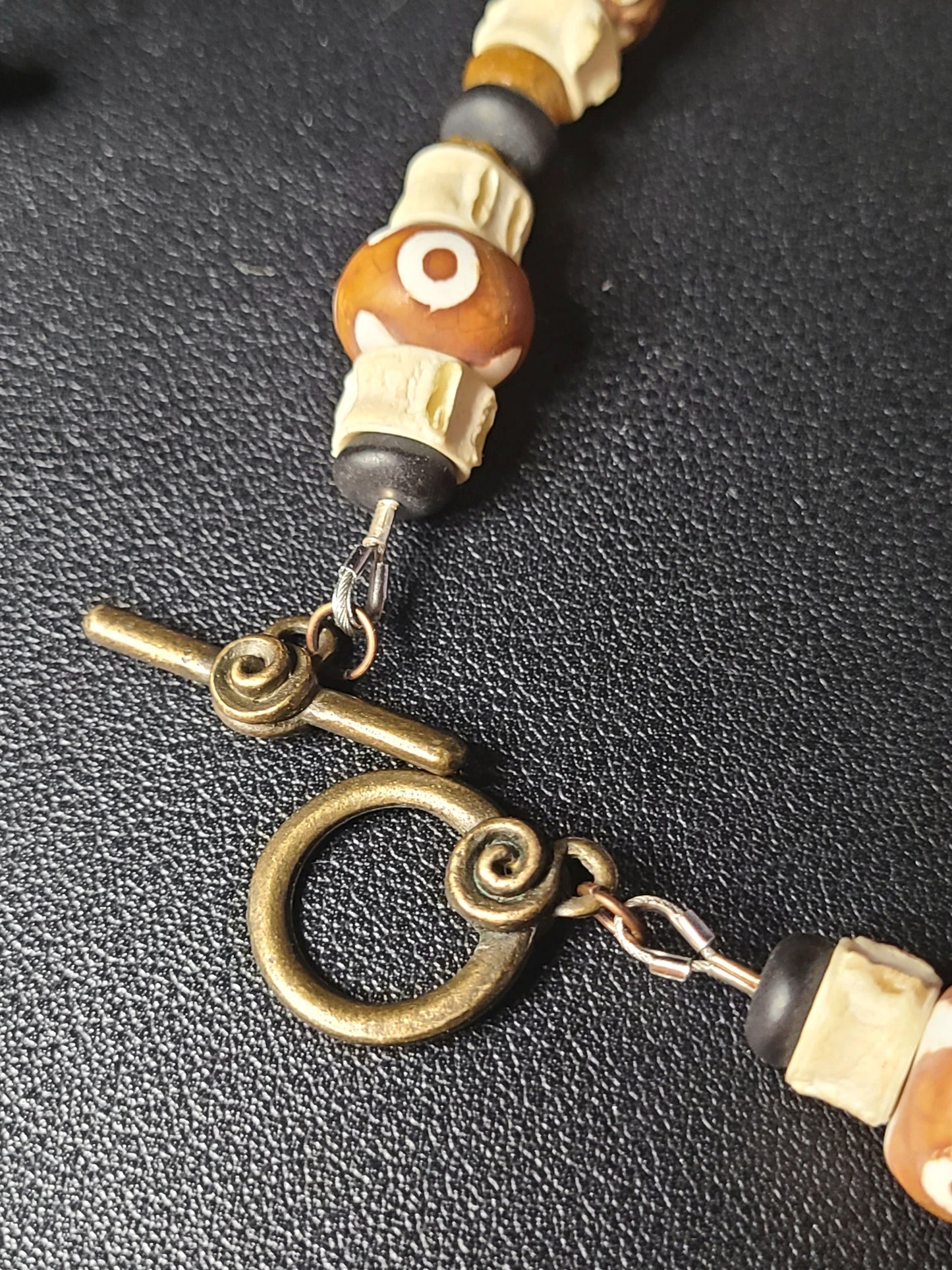 Earth Bone and Brass